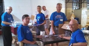 25 volunteers from the Medtronic VSP Retiree Group sorted and packed hand instruments for distribution to Mano a Mano's projects in Bolivia; they also packed medical supplies and sorted liquids and medications (not pictured).. All of these medical supplies were donated to Mano a Mano by Twin Cities-area hospitals and volunteers.