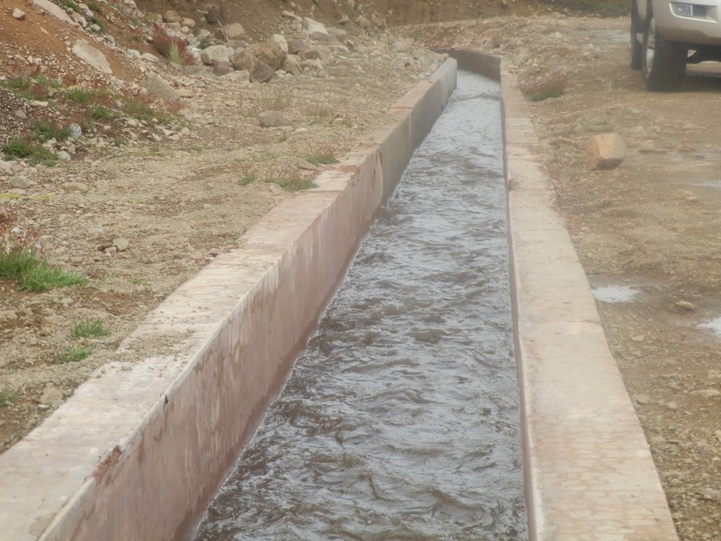 One of the concrete channels that direct snow melt from the mountain and rainwater to the reservoir.
