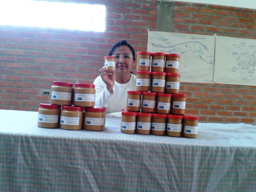 Mano a Mano agronomist Camila with our first batch of peanut butter! Taken March 3rd, 2014.