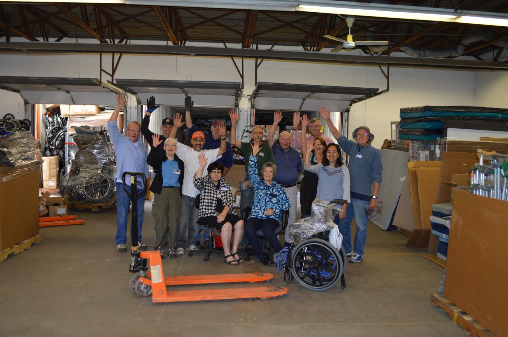 Loading 4 containers with 96,000+ pounds of surplus supplies last Friday. Of course Ray and Karen are there!