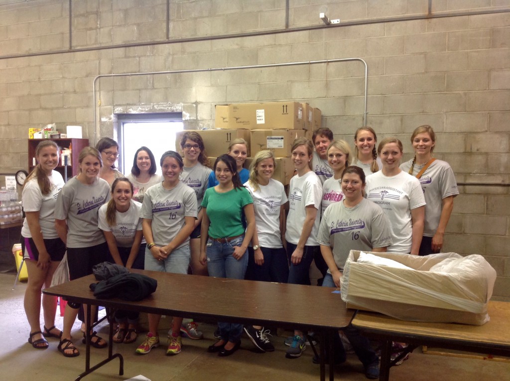 Volunteers from St. Kate's PA program at Mano a Mano in July.