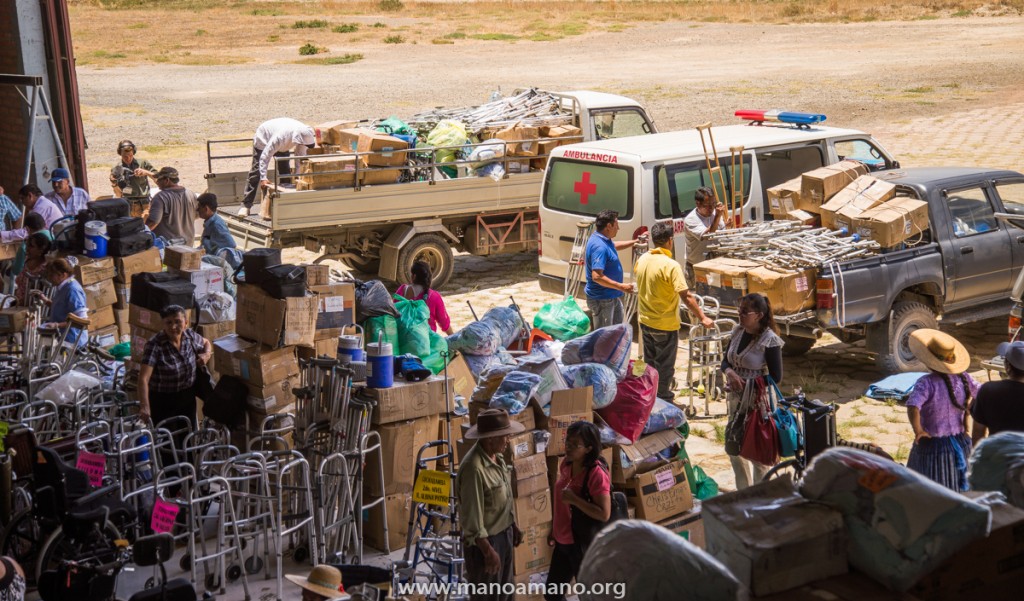 Organizations picking up donated supplies at the Mano a Mano hangar, November 23rd, 2015