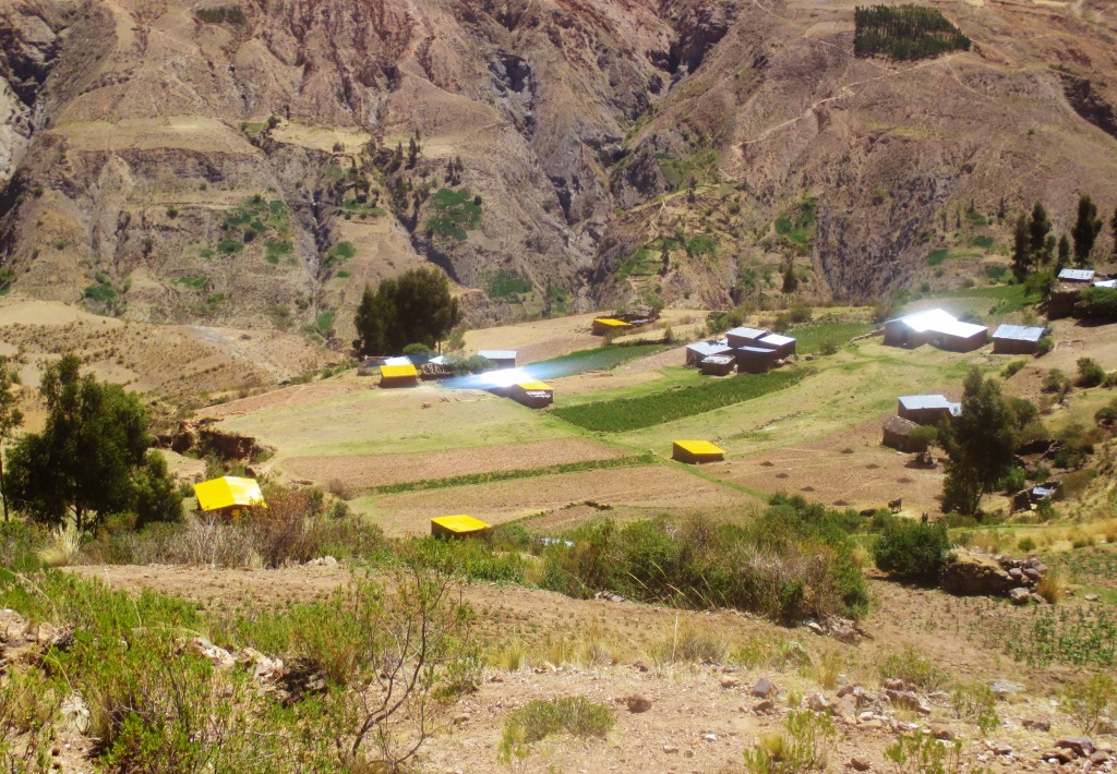 Mano a Mano greenhouses (yellow-topped buildings) now dot the landscape.