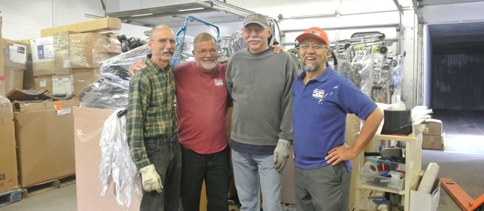 From left to right: Ray, Mark, Bob, and Mano a Mano co-founder Segundo Velasquez, loading supplies to ship in June 2016.
