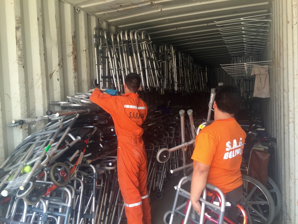 Unloading 1 of the 4 40-foot containers shipped from Mano a Mano's St. Paul, MN warehouse, at the CEA in Cochabamba, Bolivia.